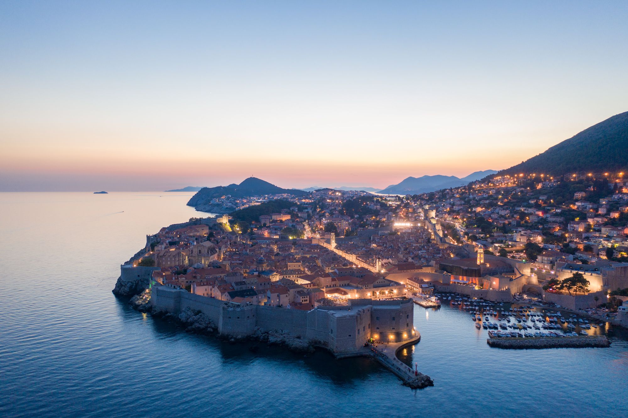 The walled city of Dubrovnik at sunset in Croatia